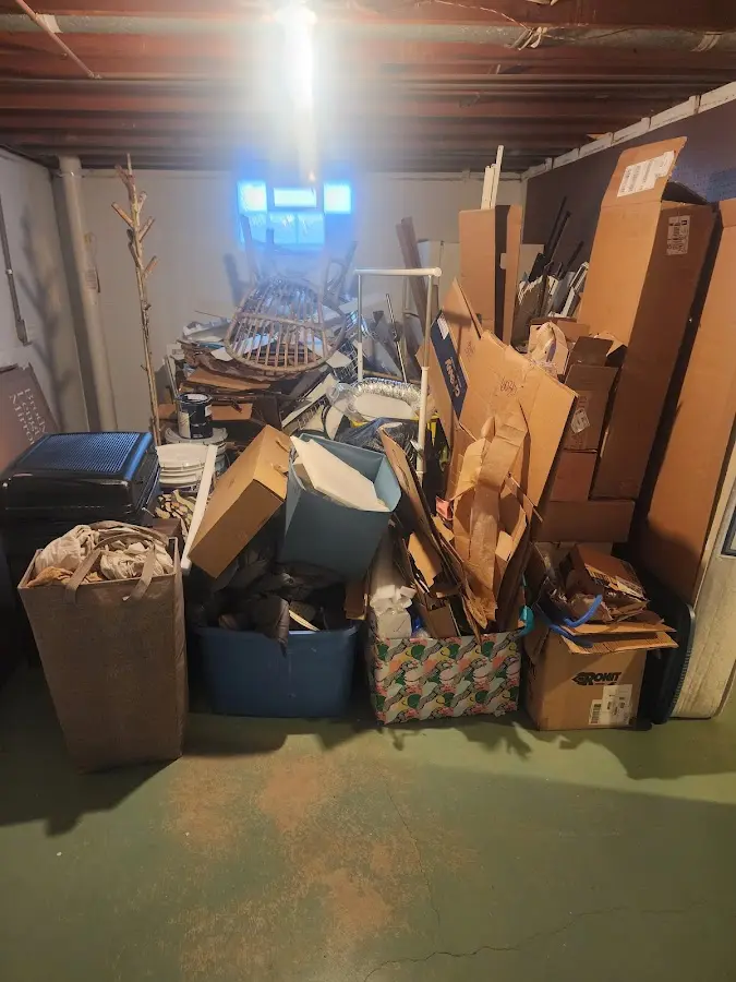 Roll-off dumpster container at job site for Yard Waste Dumpster Rental in De Soto